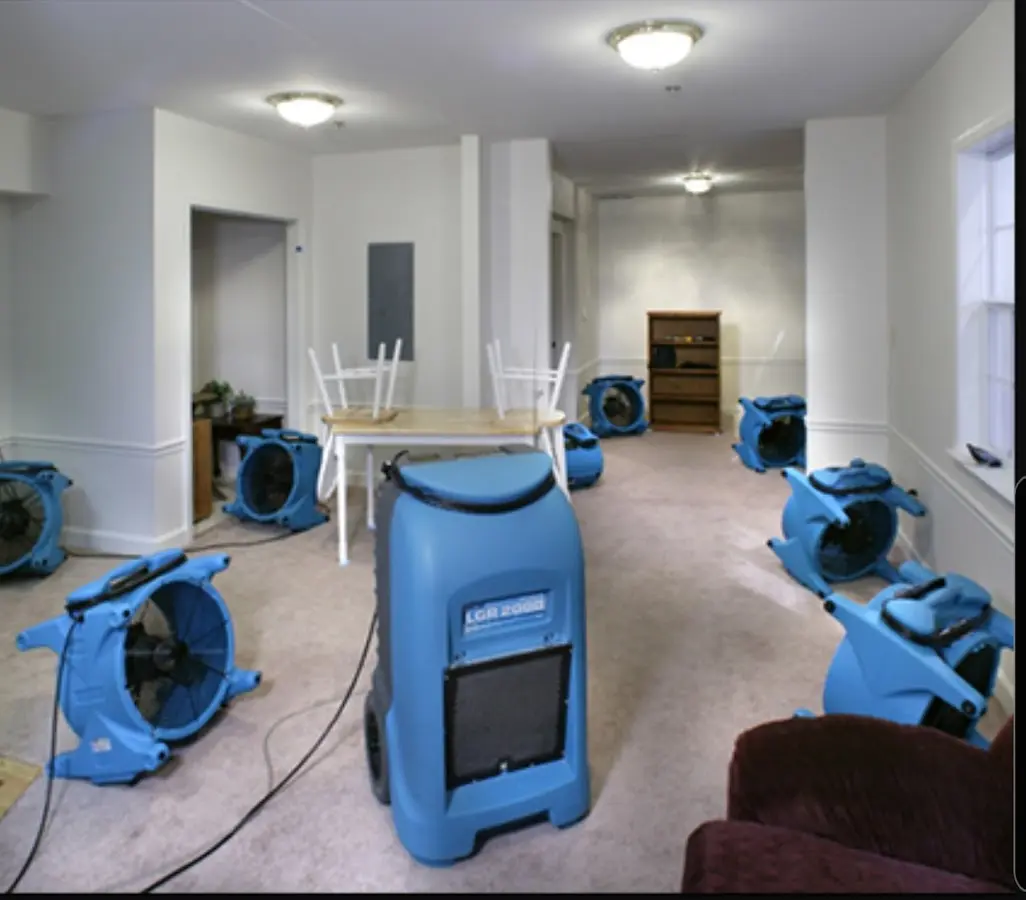 Air movers and dehumidifier setup for Water Extraction & Removal in Monticello